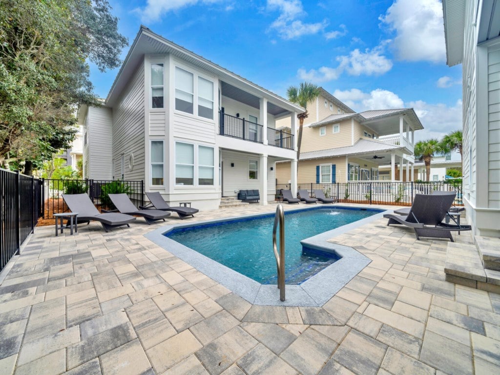 Private swimming pool and white home at Sea-N-Double